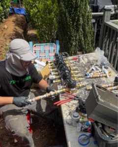 True Plumbing Heating Cooling Technician Preparing New Water Meters