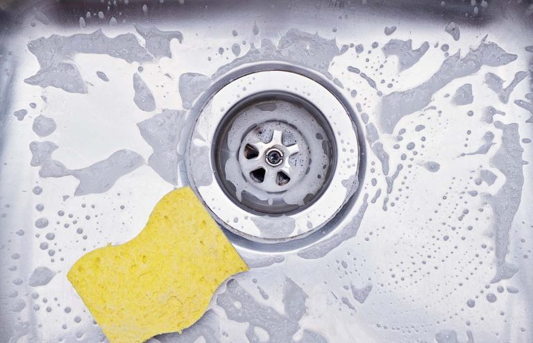Closeup Sink Drain Yellow Sponge Cleaning