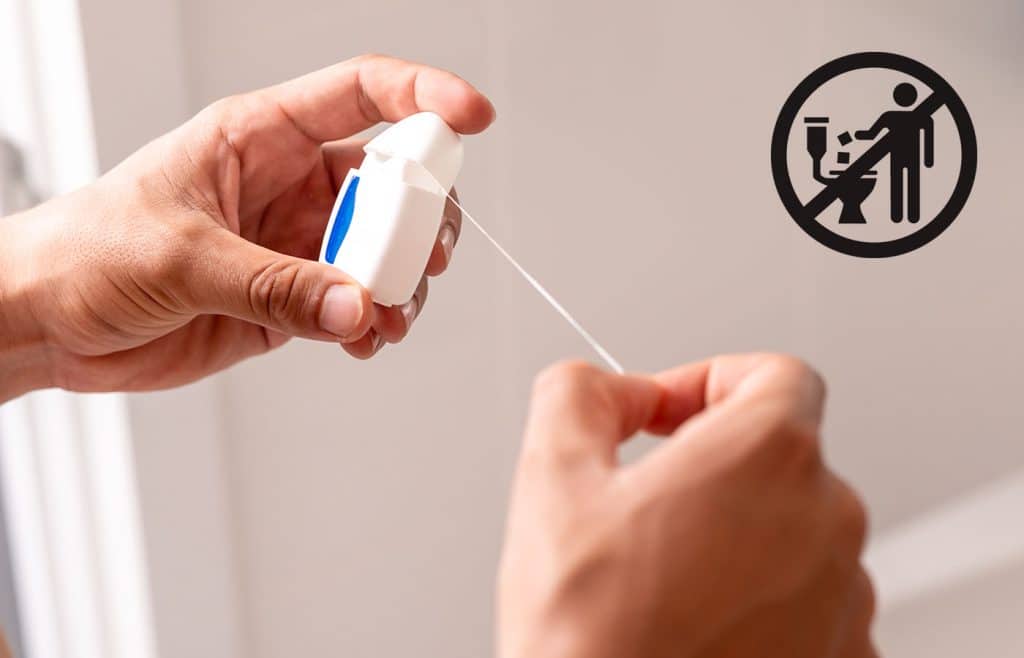 dental floss do not flush down toilet