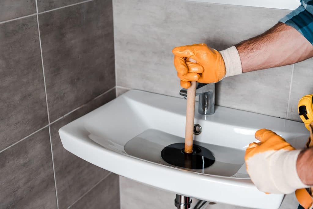holding plunger in sink plumbing repair dunwoody